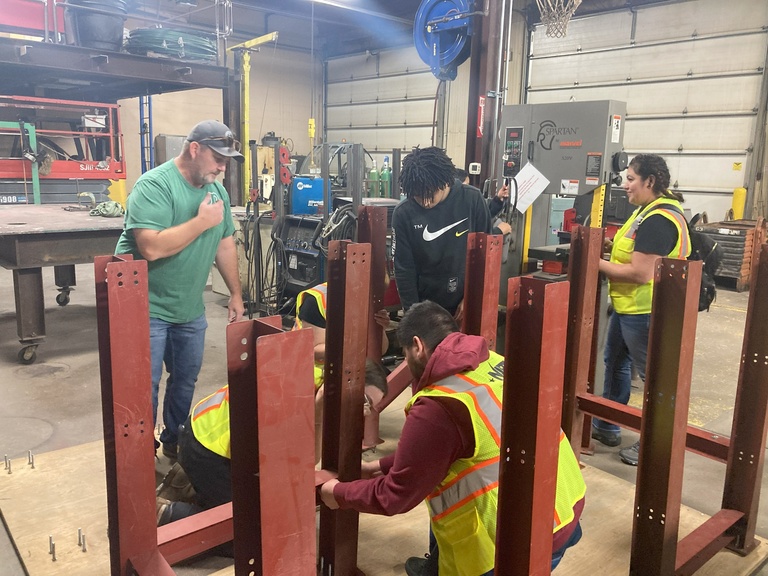 Pre-apprentices touring iron workers training center