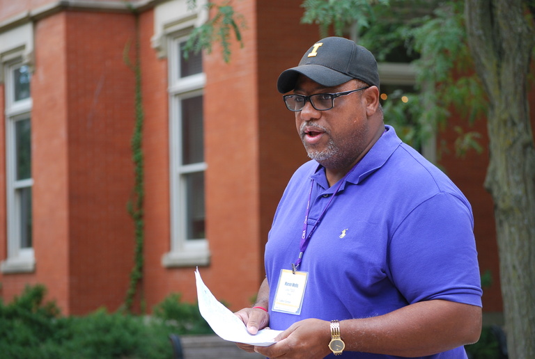 A student giving a short speech at a public speaking class